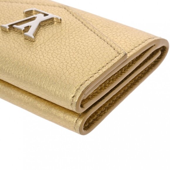 LOUIS VUITTON Gold purse - Picture 5 of 12